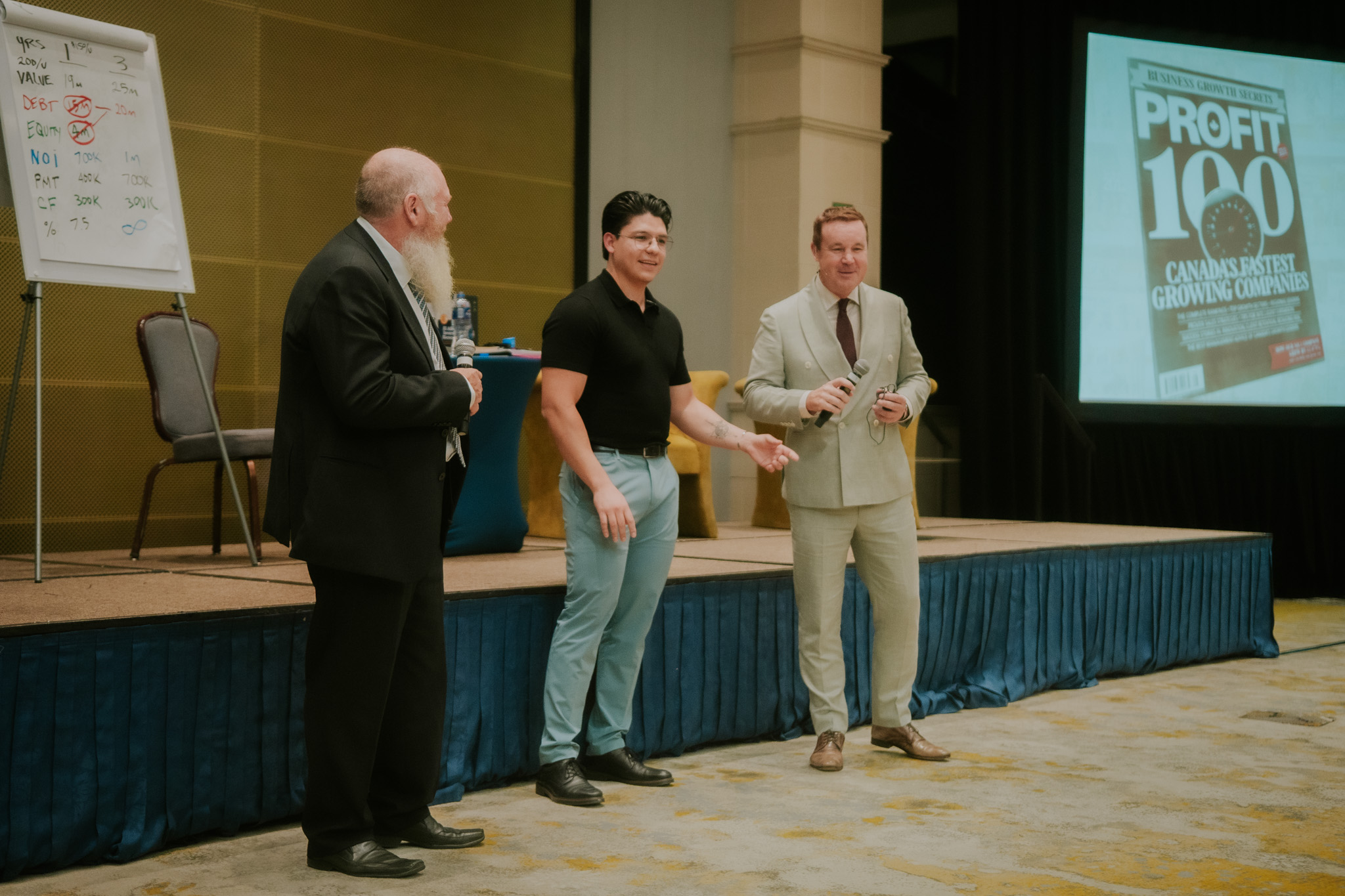 Chris of Growth Kingdom on stage with business growth industry leaders